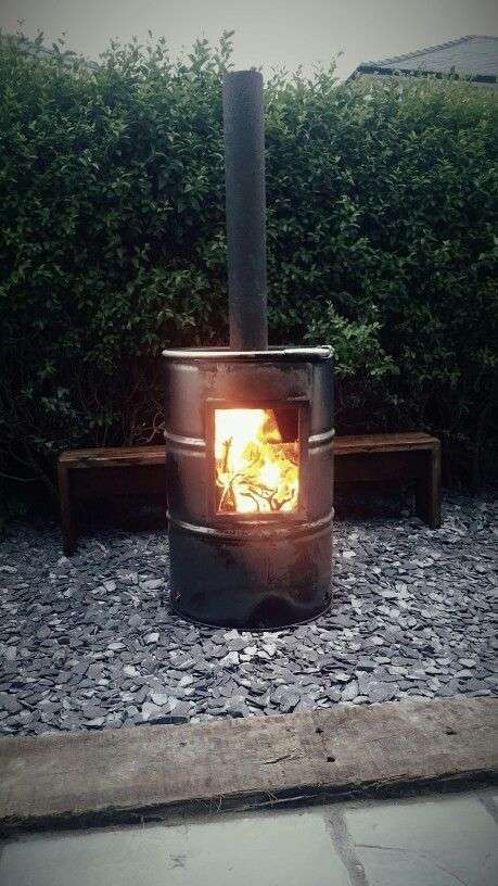 Homemade firepit in a barrel