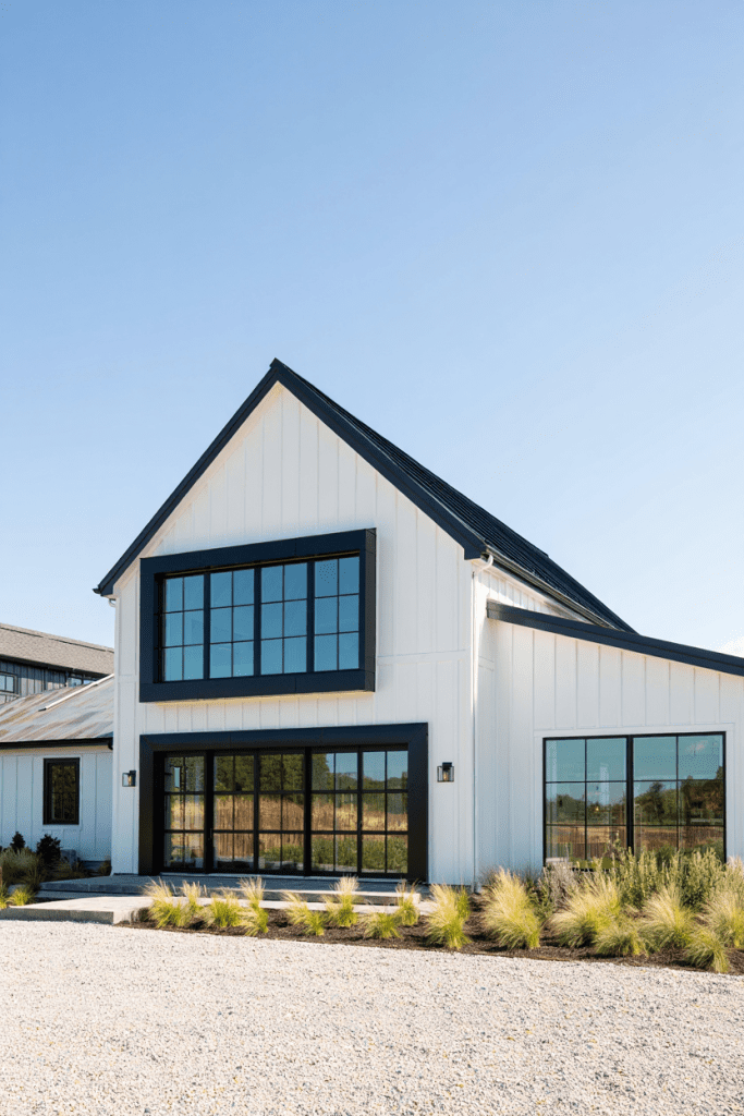 black framed windows against white exterior on a Farmhouse Barndominium Idea