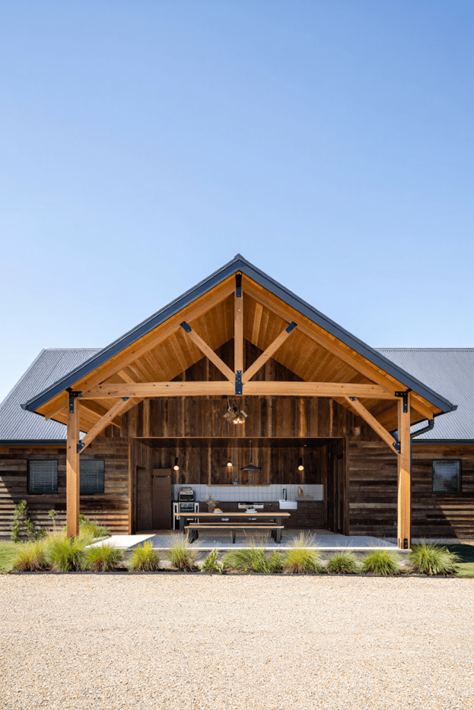covered outdoor kitchen with old reclaimed wood