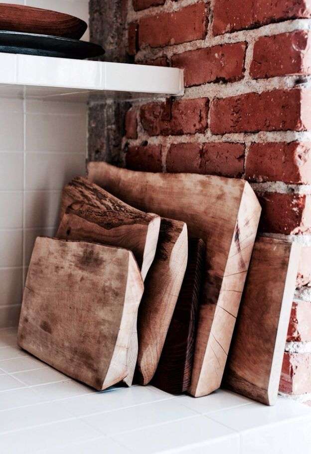 Raw Wood Cutting Boards in earthy kitchen