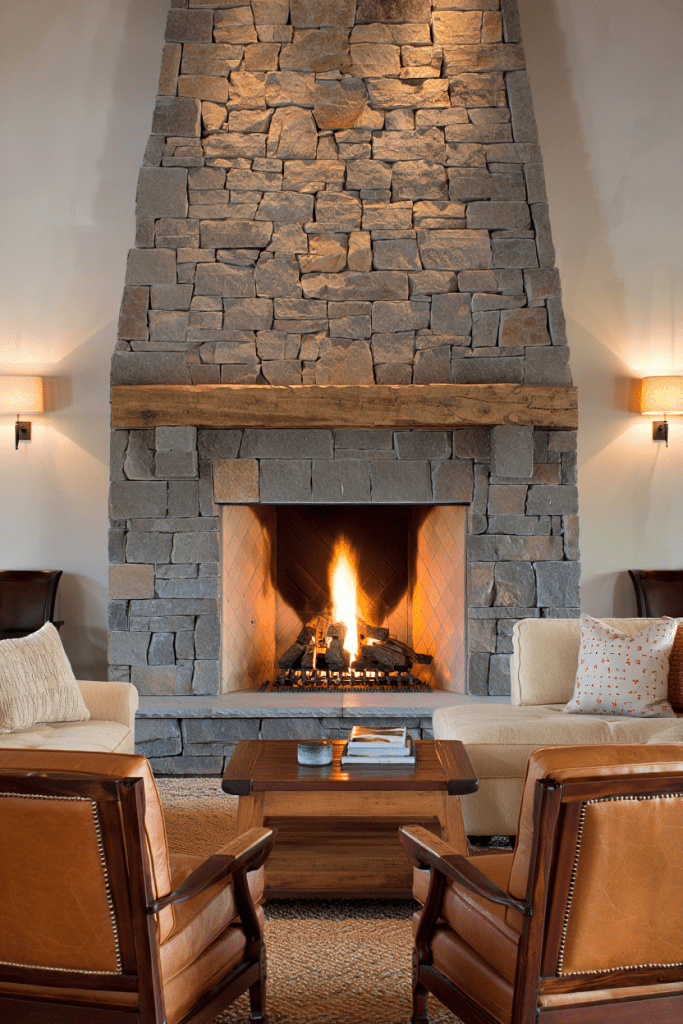 floor to ceiling stone fireplace