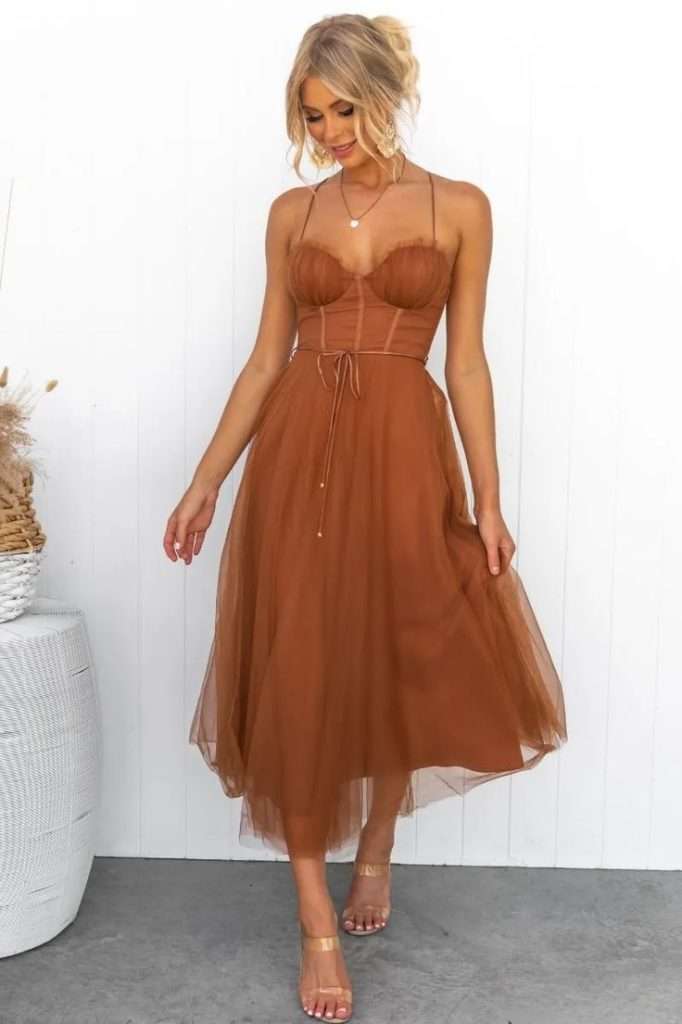 tea-length rust coloured dress