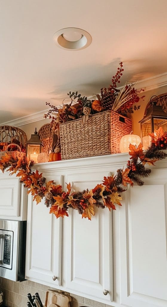 rustic fall decor on top of kitchen cabinets