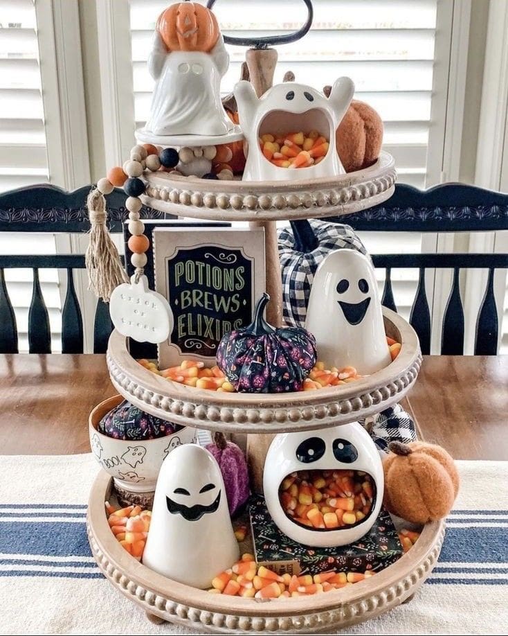 tiered kitchen tray with different halloween themed ornaments