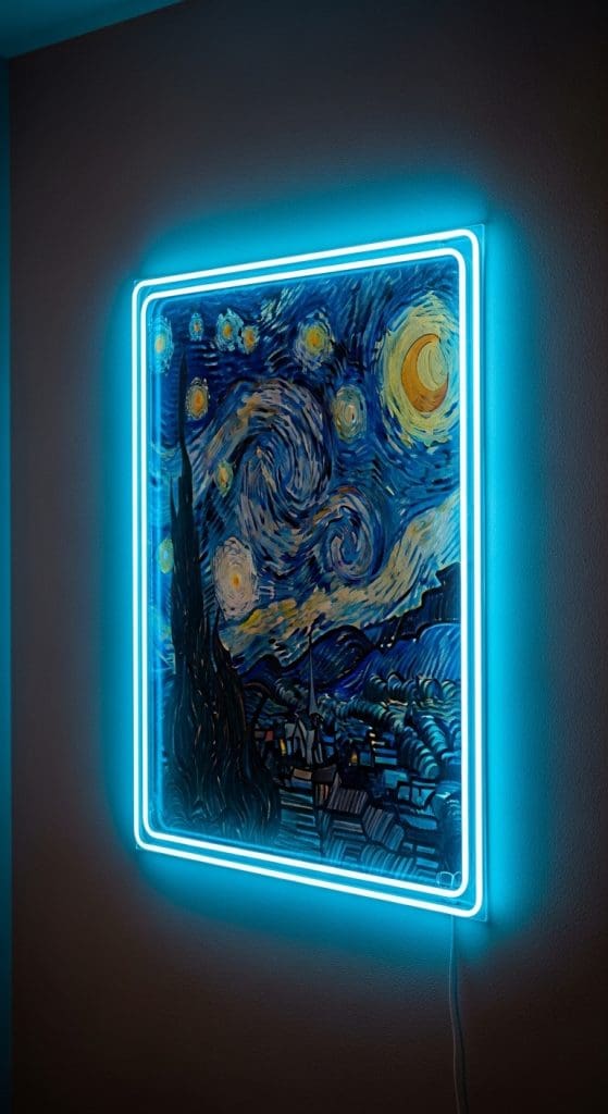 neon blue light around a starry night picture on a wall