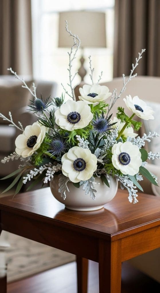 Winter Flower Arrangement of Anemones and eucalyptus sprigs on a coffee table
