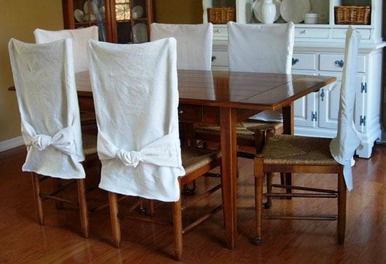 pillow cases being used as chair covers 