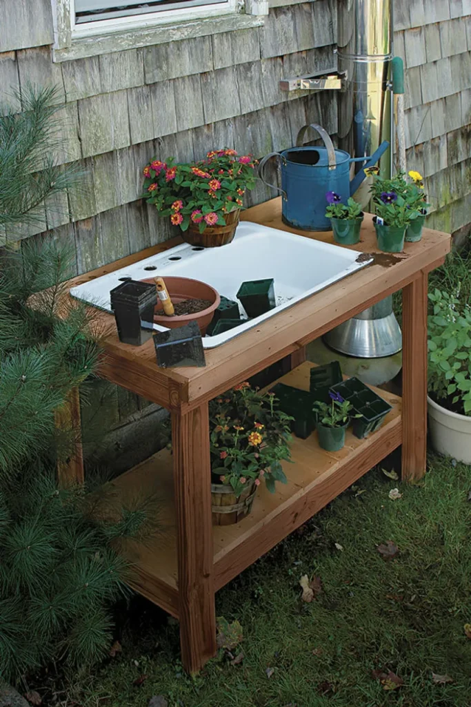 potting bench with a white sink