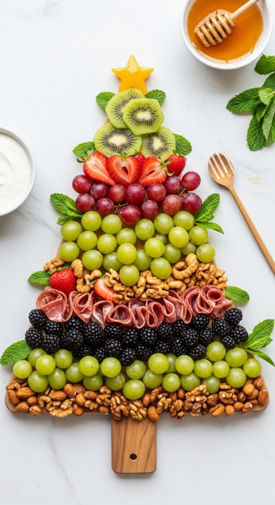 fruit and nuts on a christmas shaped board to share over christmas