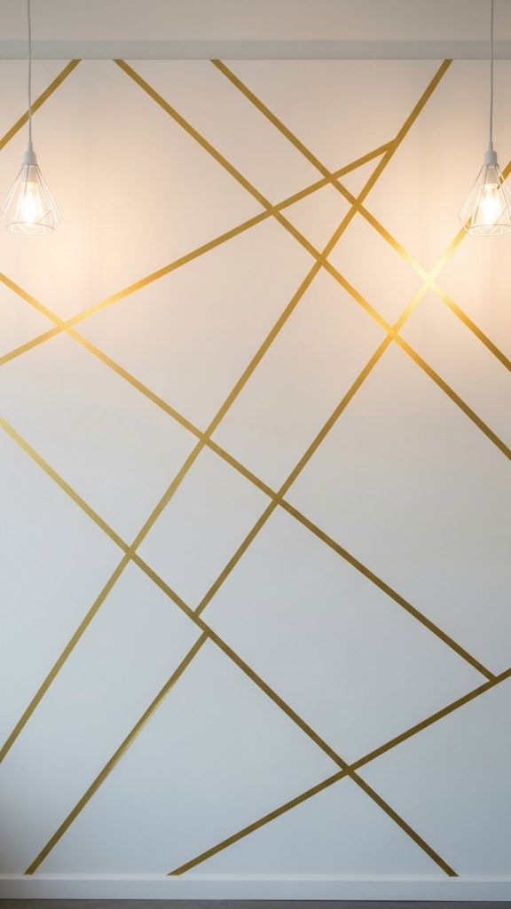 Gold diagonal lines made on white wall for new years eve photos