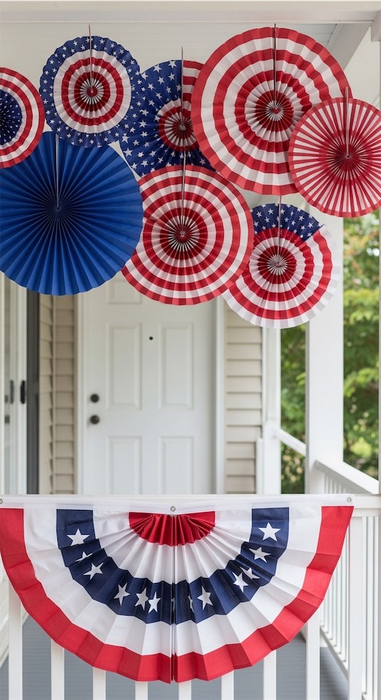 paper fans hanging on front porch Patriotic Porch Ideas