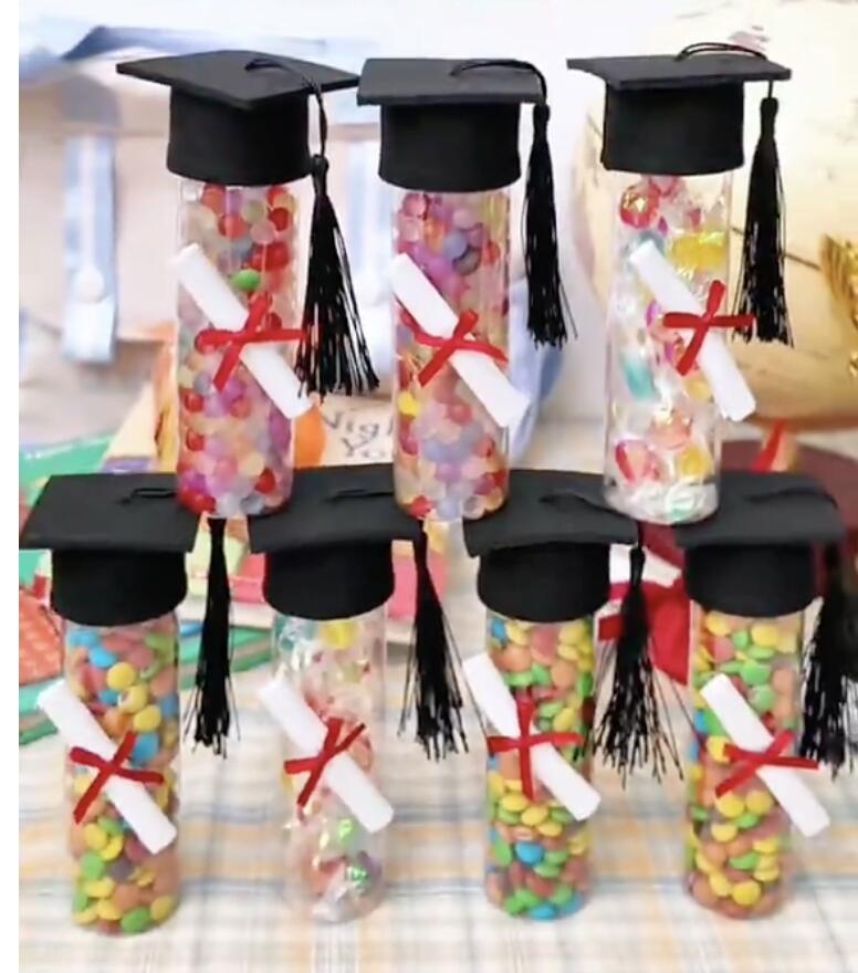 mini graduation caps decorating graduation table and sweets