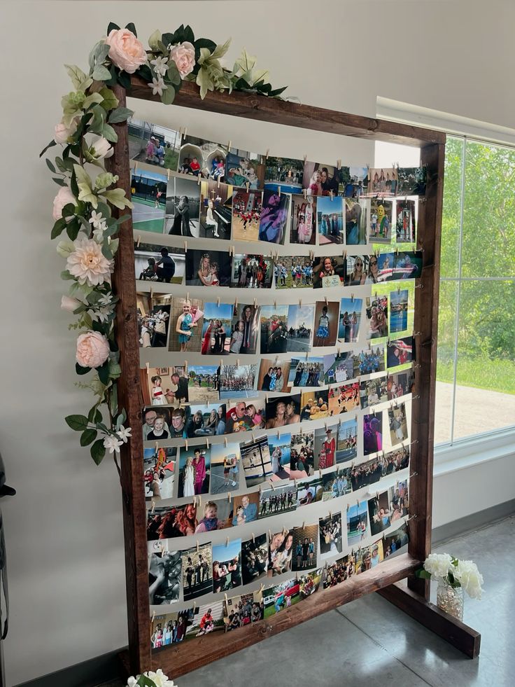 stand with photos of graduates