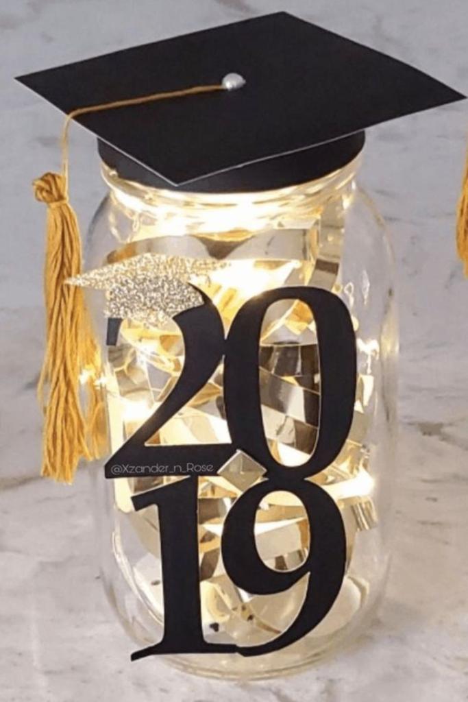year and hat on Graduation Mason Jar Centerpieces
