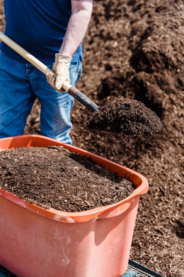 compost being added to a garden