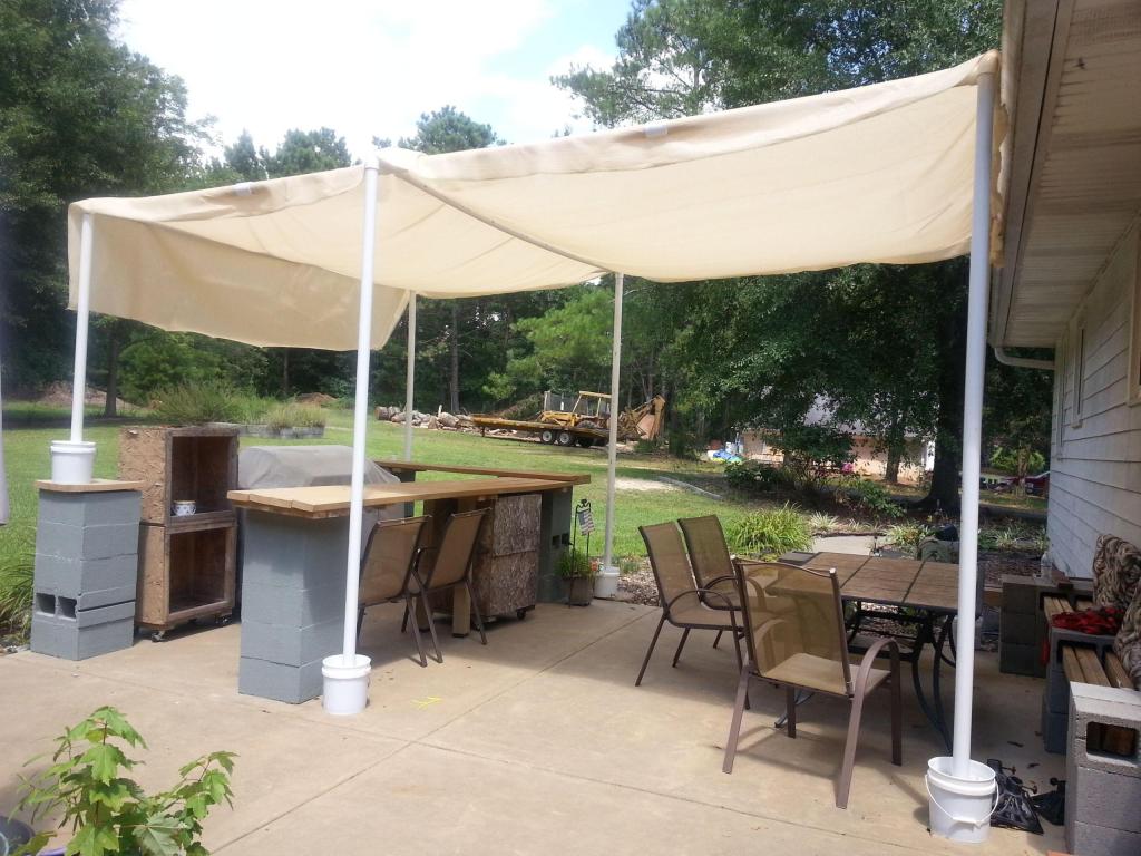 concrete buckets used to prop up DIY Shade Outdoor Cheap Ideas