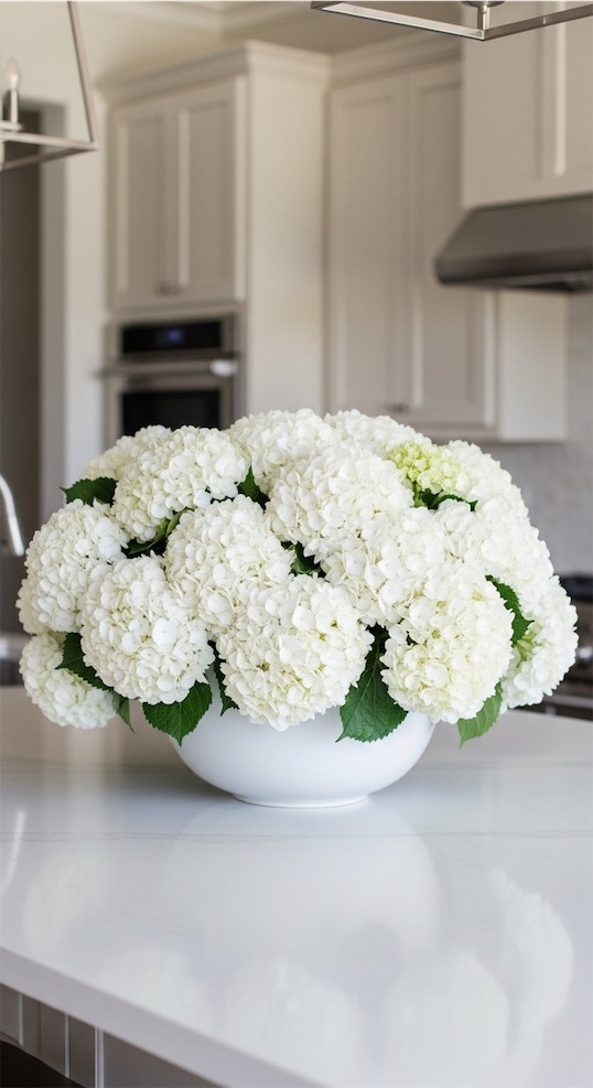 white dough bowl with hydrangeas 