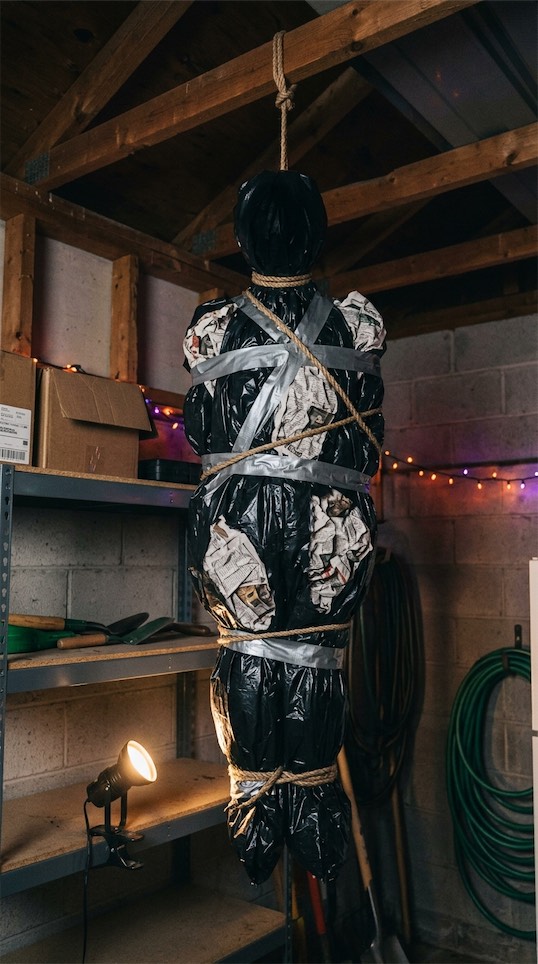 body made with black plastic bags halloween decor