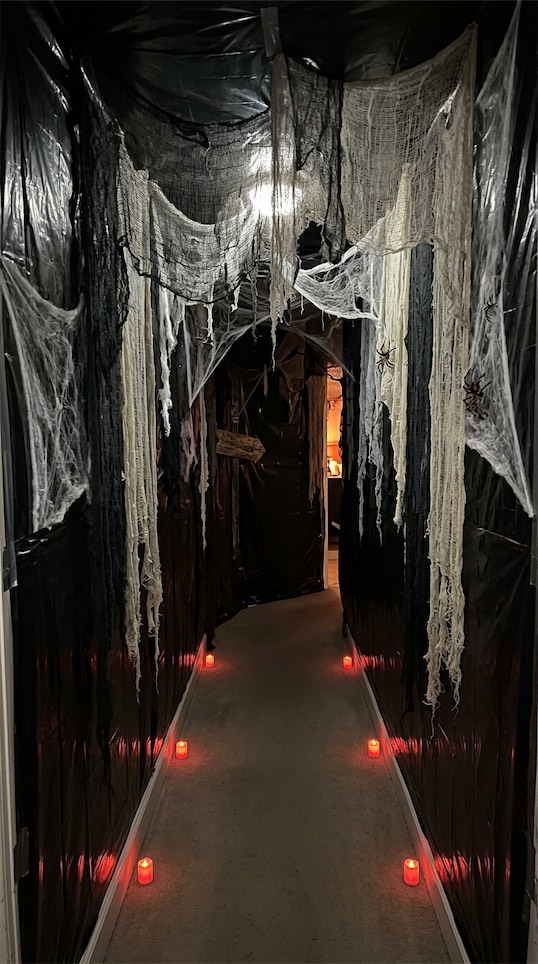 halloween decor tunnel made with cheesecloth hallway Halloween Party Decor Ideas